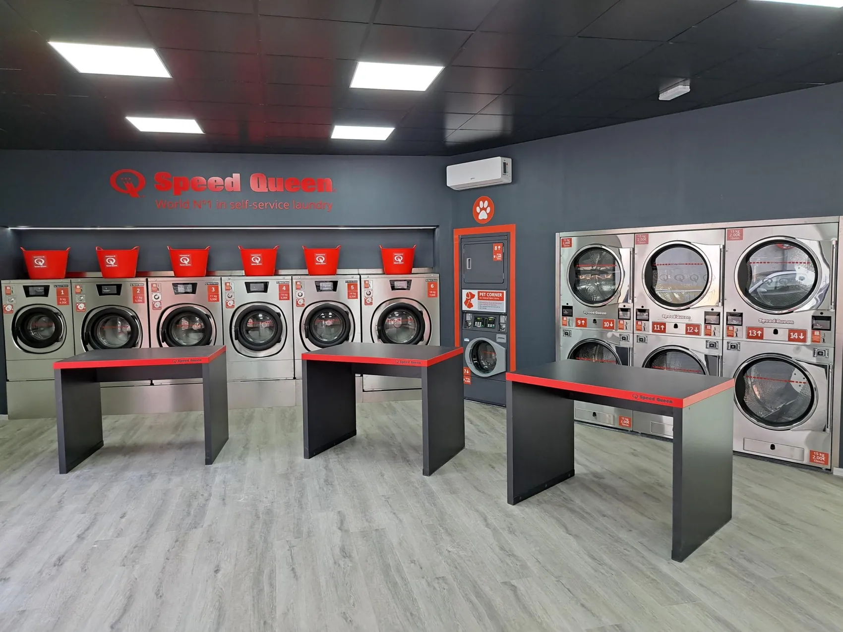 Professional Speed Queen washers in a Gira Gira laundromat